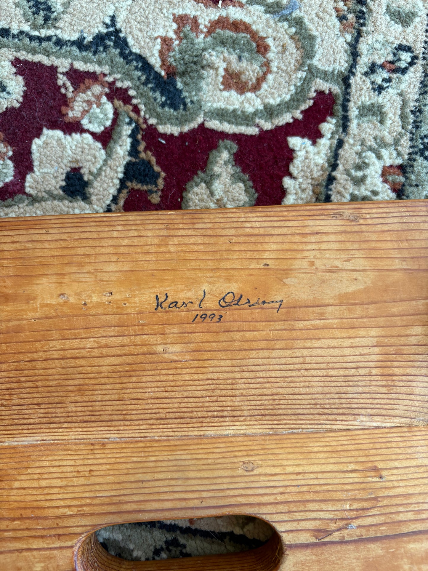 Signed “Karl 1993” Hand-Made Pine Stool – Tapered Legs, Carry Slot, 15″