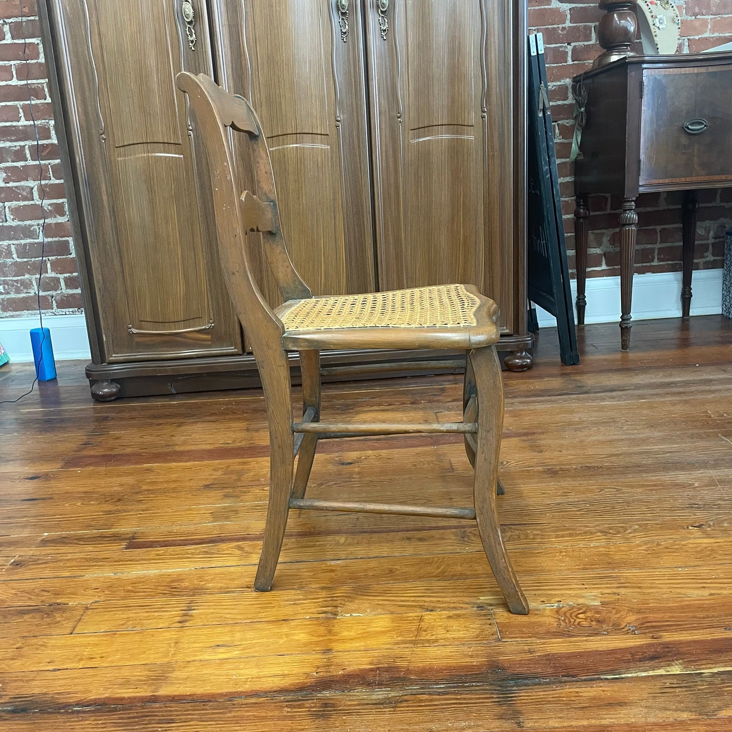 Vintage Ladder Back Wood Chair with Handwoven Cane Seat
