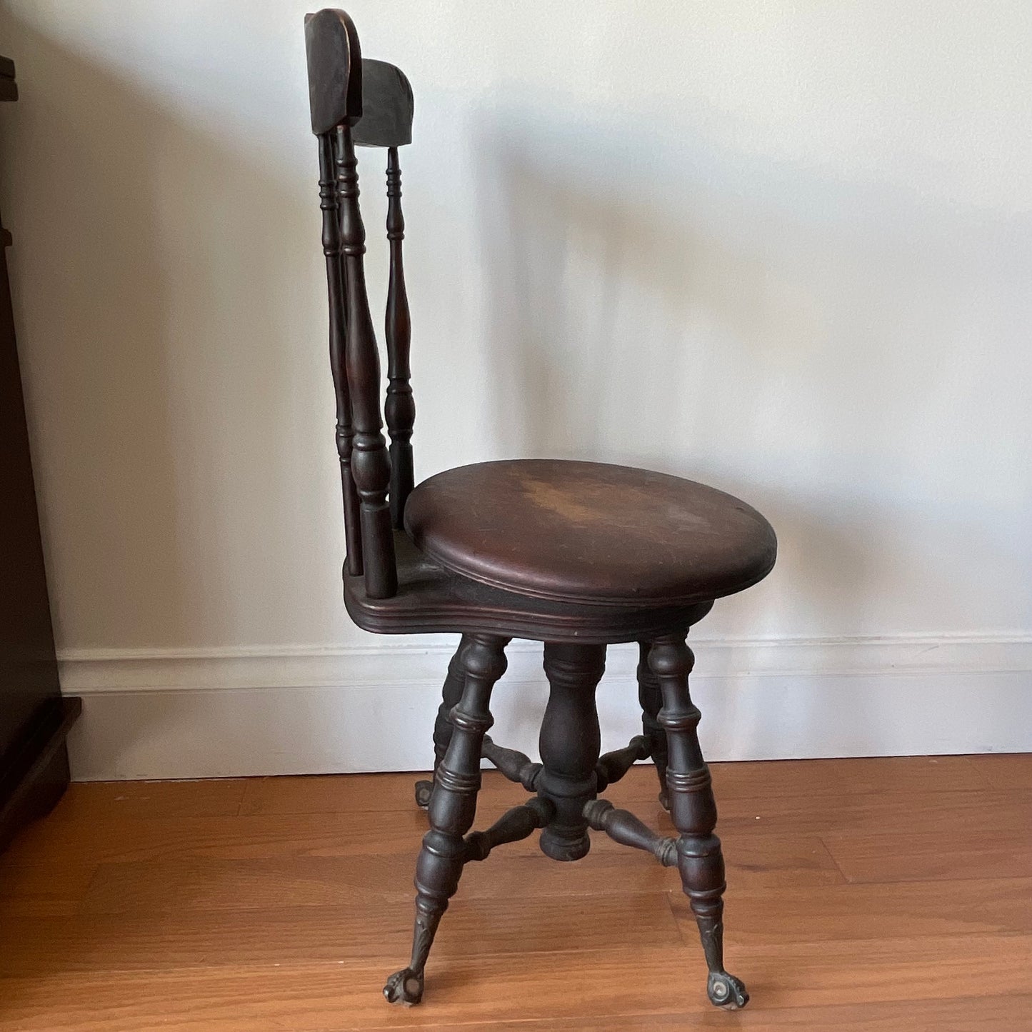 Antique Swivel Piano Chair with Claw Feet and Carved Backrest