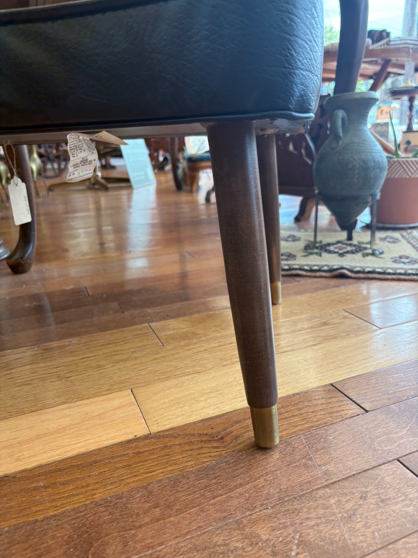 Mid-Century Black Vinyl Footstool – Crawford No. 3994 with Brass Leg Detail