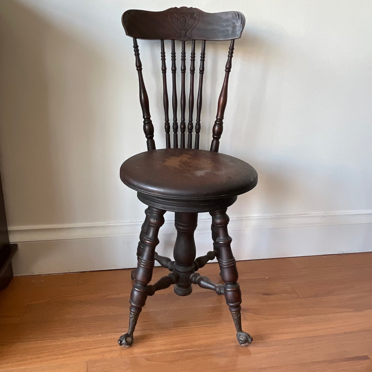Antique Swivel Piano Chair with Claw Feet and Carved Backrest