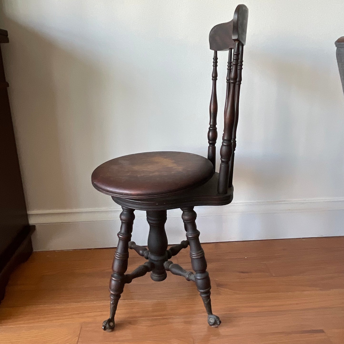 Antique Swivel Piano Chair with Claw Feet and Carved Backrest