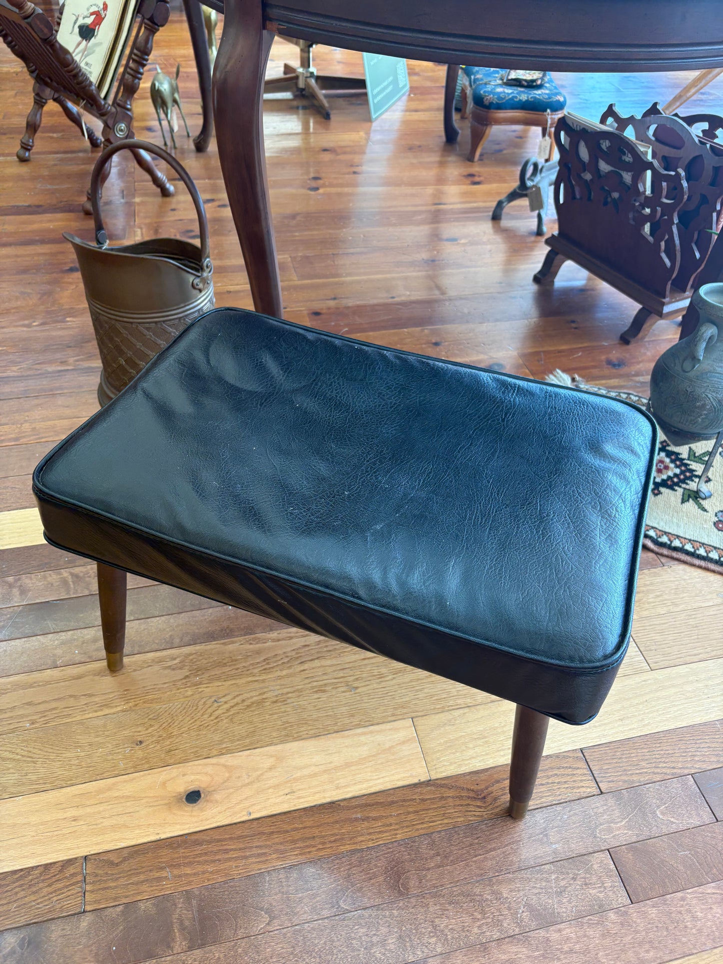 Mid-Century Black Vinyl Footstool – Crawford No. 3994 with Brass Leg Detail