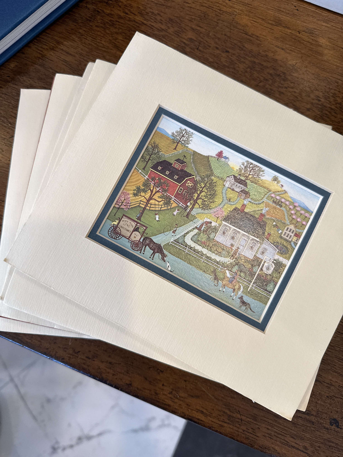 Set of five matted Linda Nelson folk-art country prints, 1981, arranged together