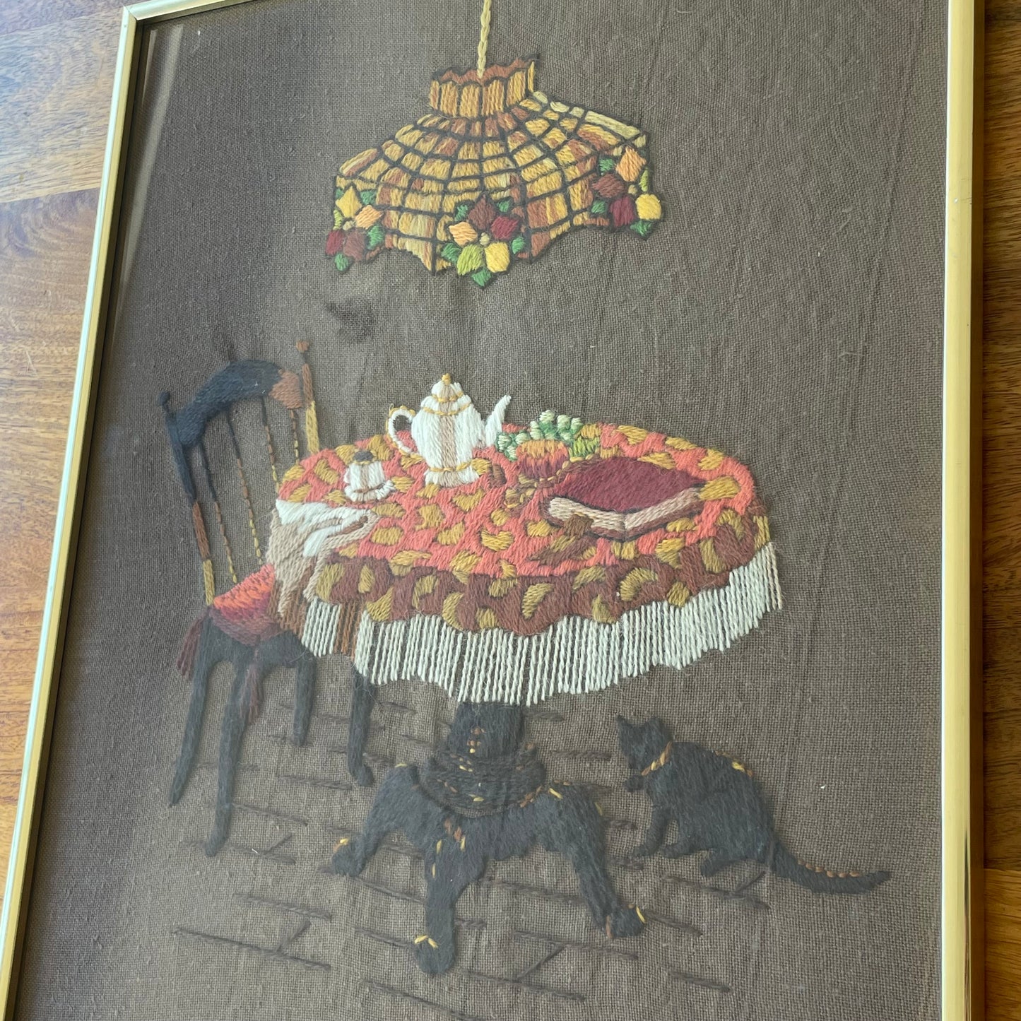Vintage Still Life Needle Point in Gold Metal Frame, Cat at Tea Time Needlepoint, Embroidery Picture Frame, Table Lamp Crewel, Retro Crewel Art, Table for Tea with Staine c. 1970s Glass Light and Black Cat, Brown needlepoint of cat and table gold frame