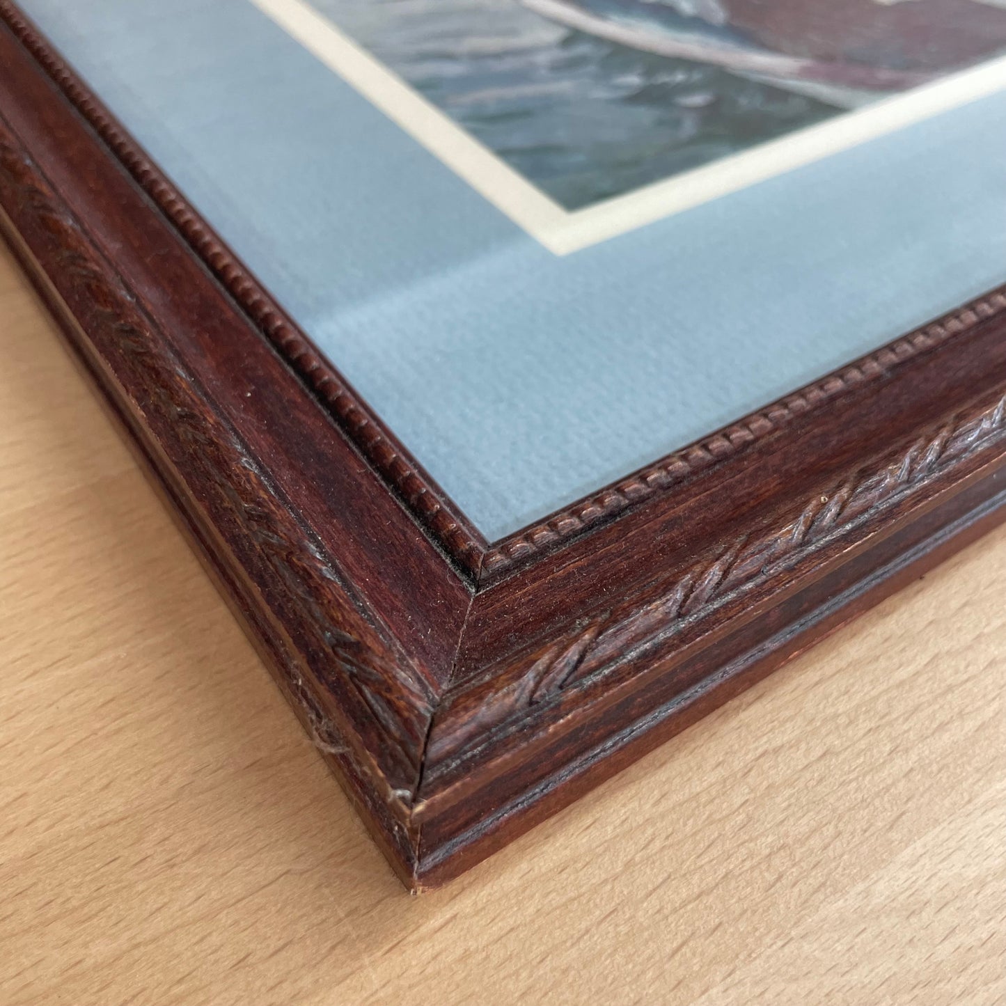Framed Print of Woman in Boat with Parasol, Signed Artwork in Blue Mat