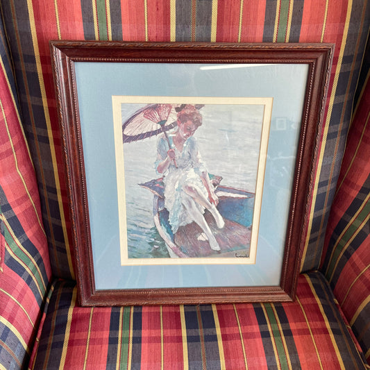 Framed Print of Woman in Boat with Parasol, Signed Artwork in Blue Mat