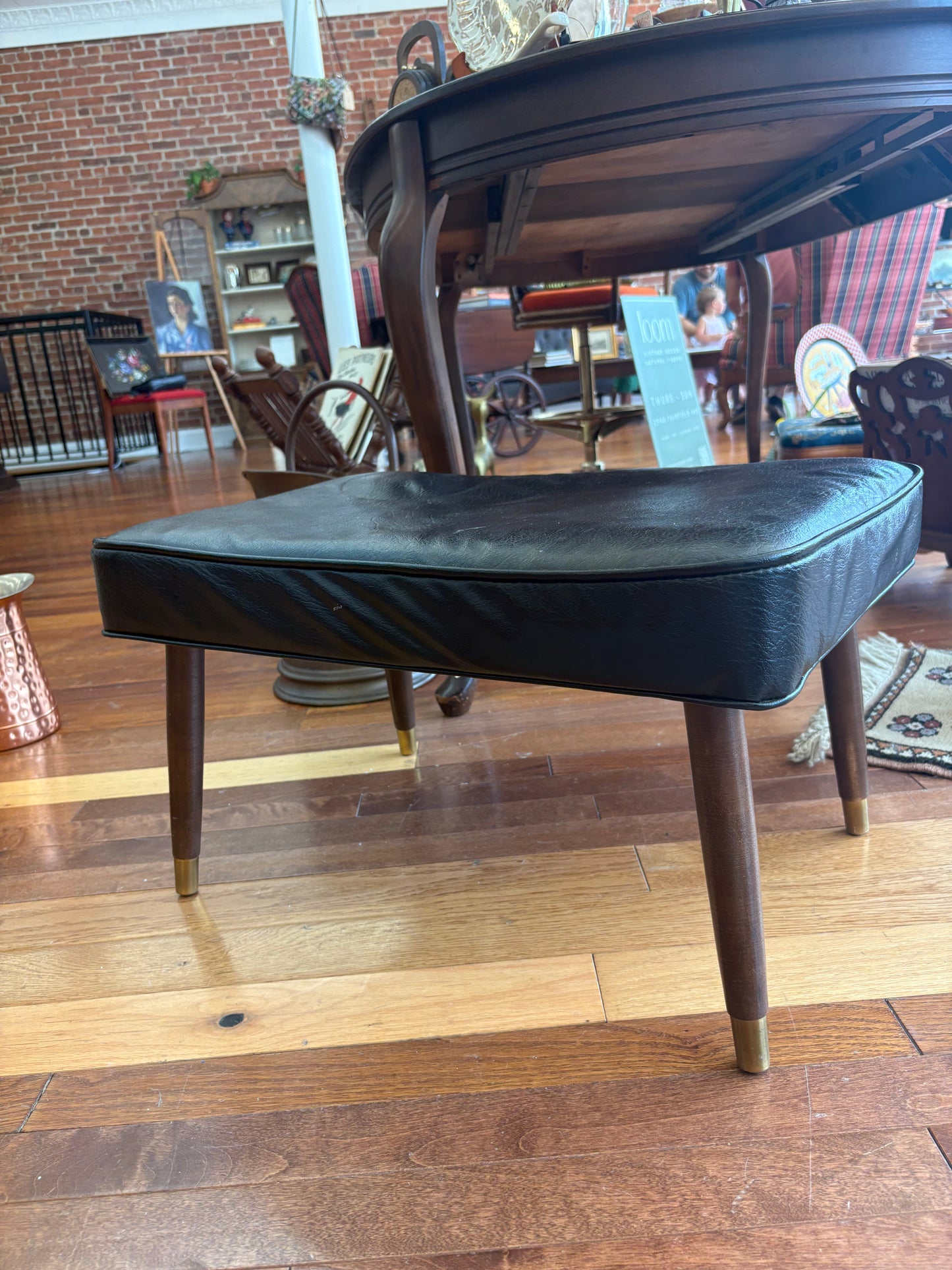 Mid-Century Black Vinyl Footstool – Crawford No. 3994 with Brass Leg Detail