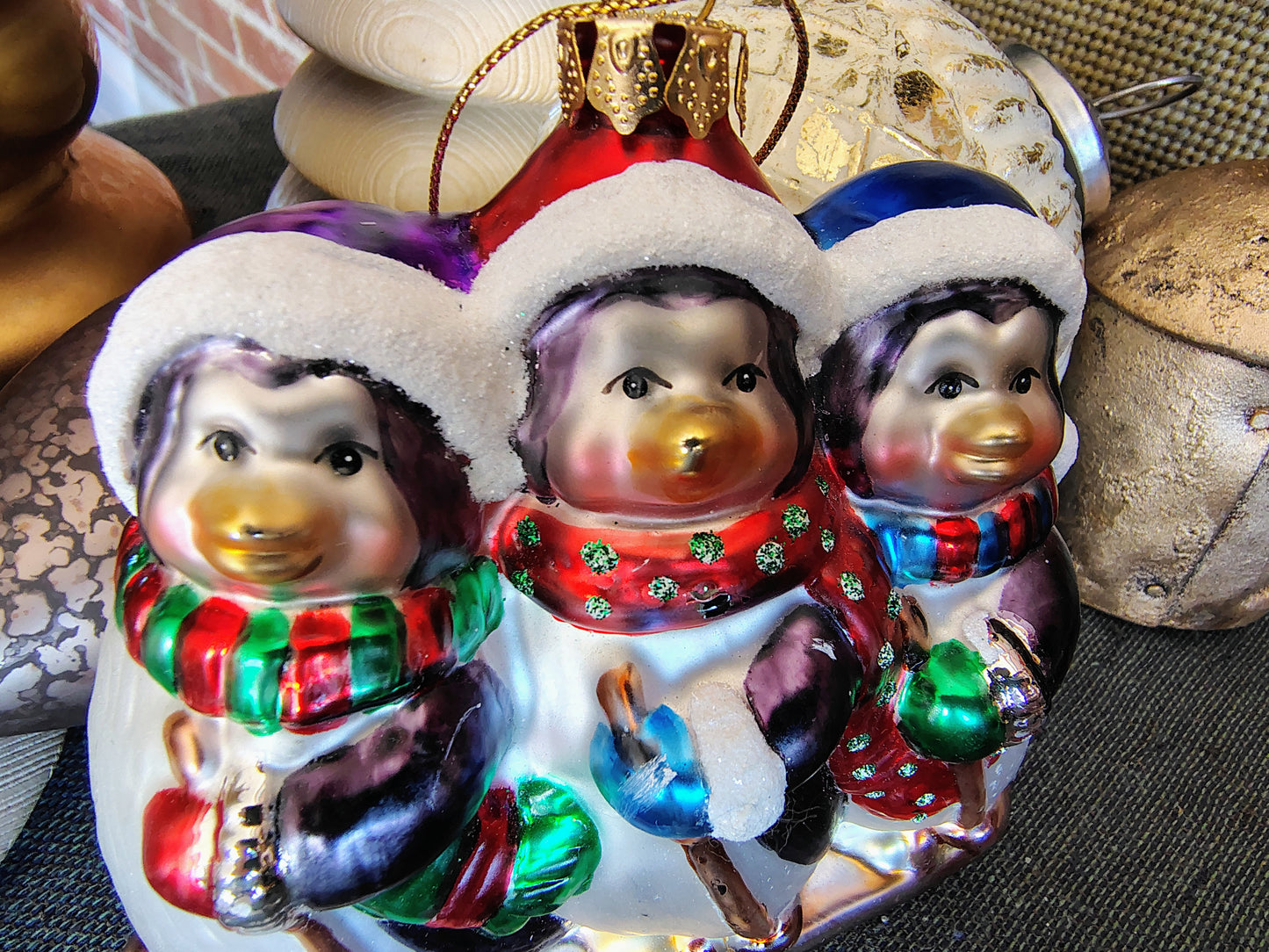 Glass Christmas Ornament – Three Skiing Penguins in Winter Scarves & Hats