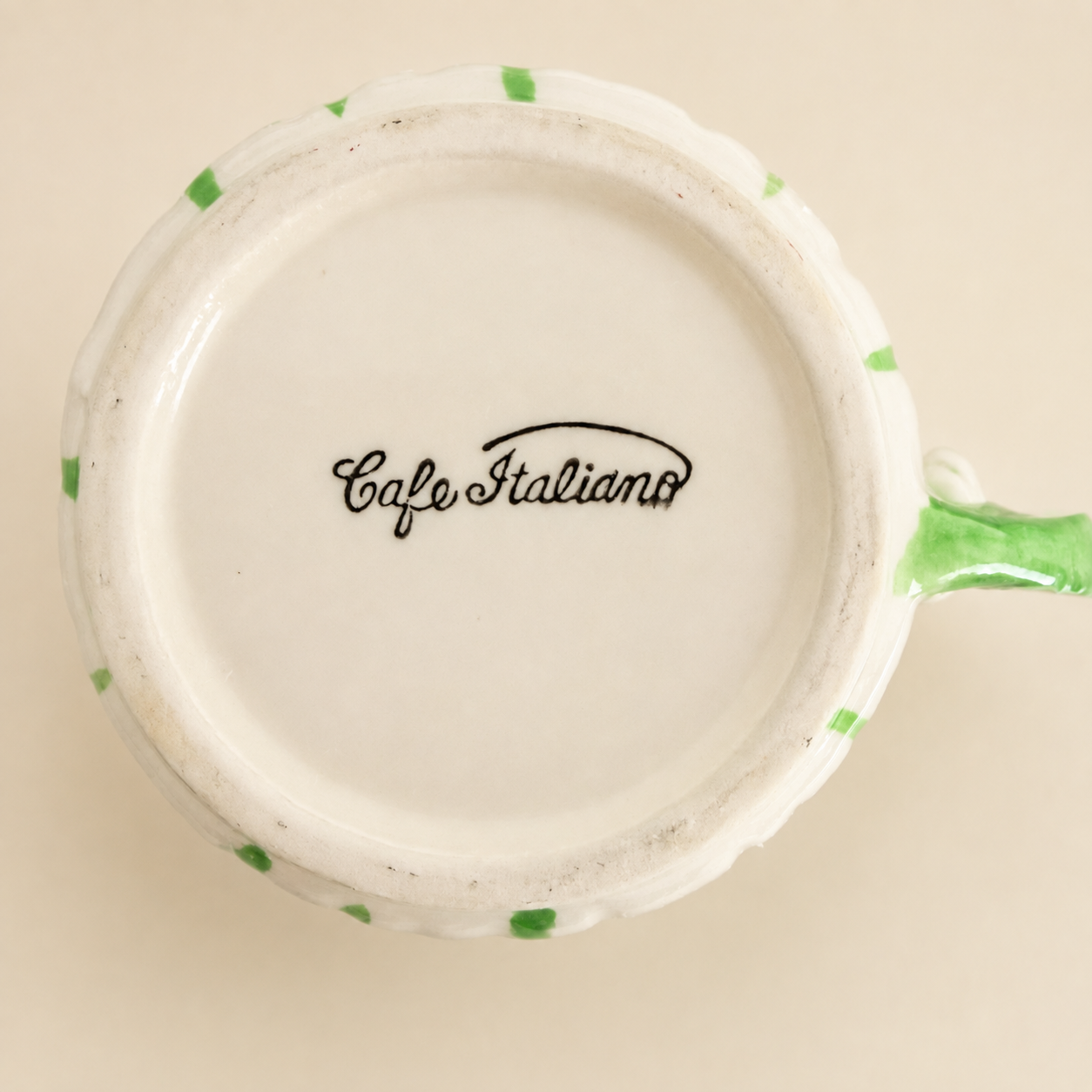 Base of cup showing "Café Italiano" maker's mark