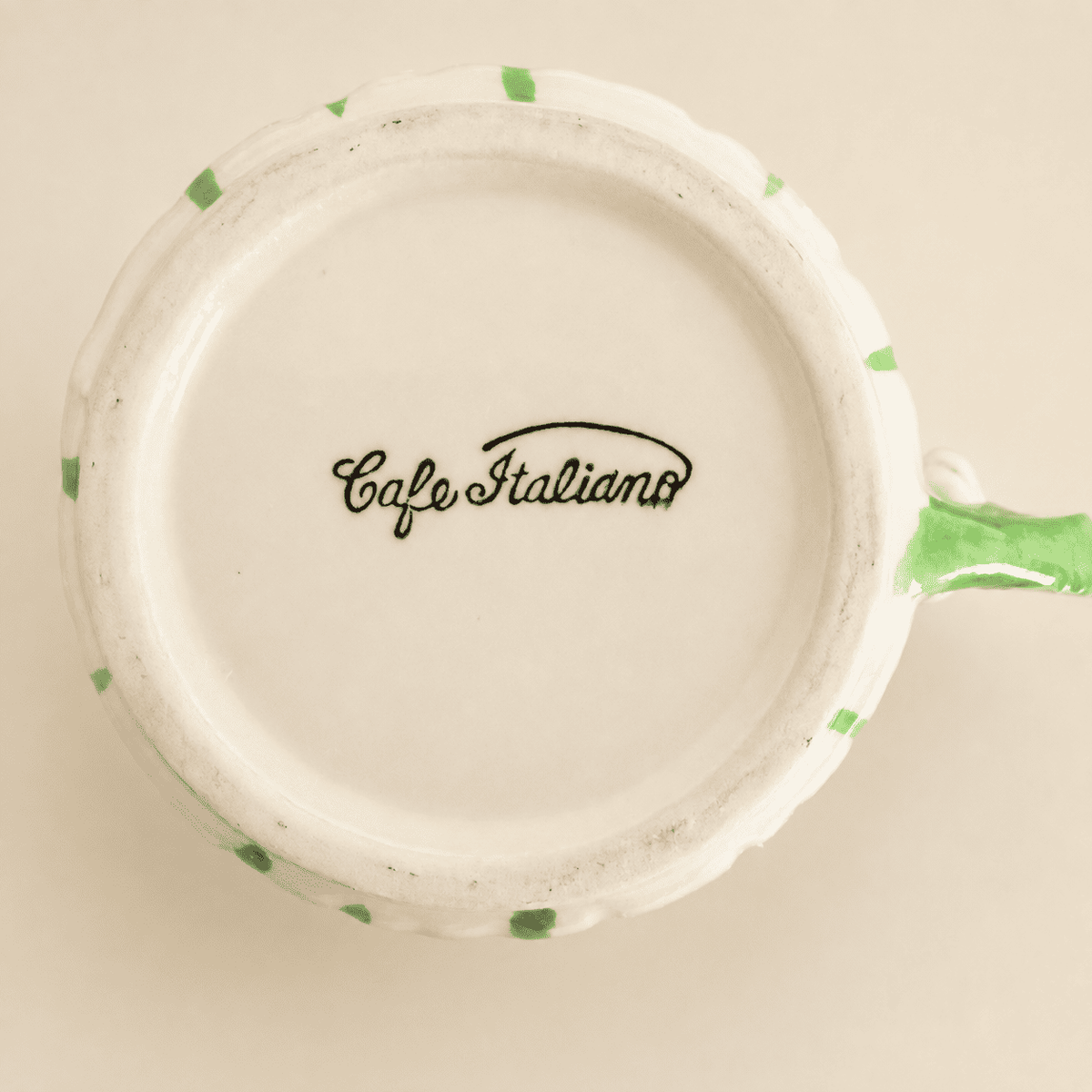 Base of cup showing "Café Italiano" maker's mark