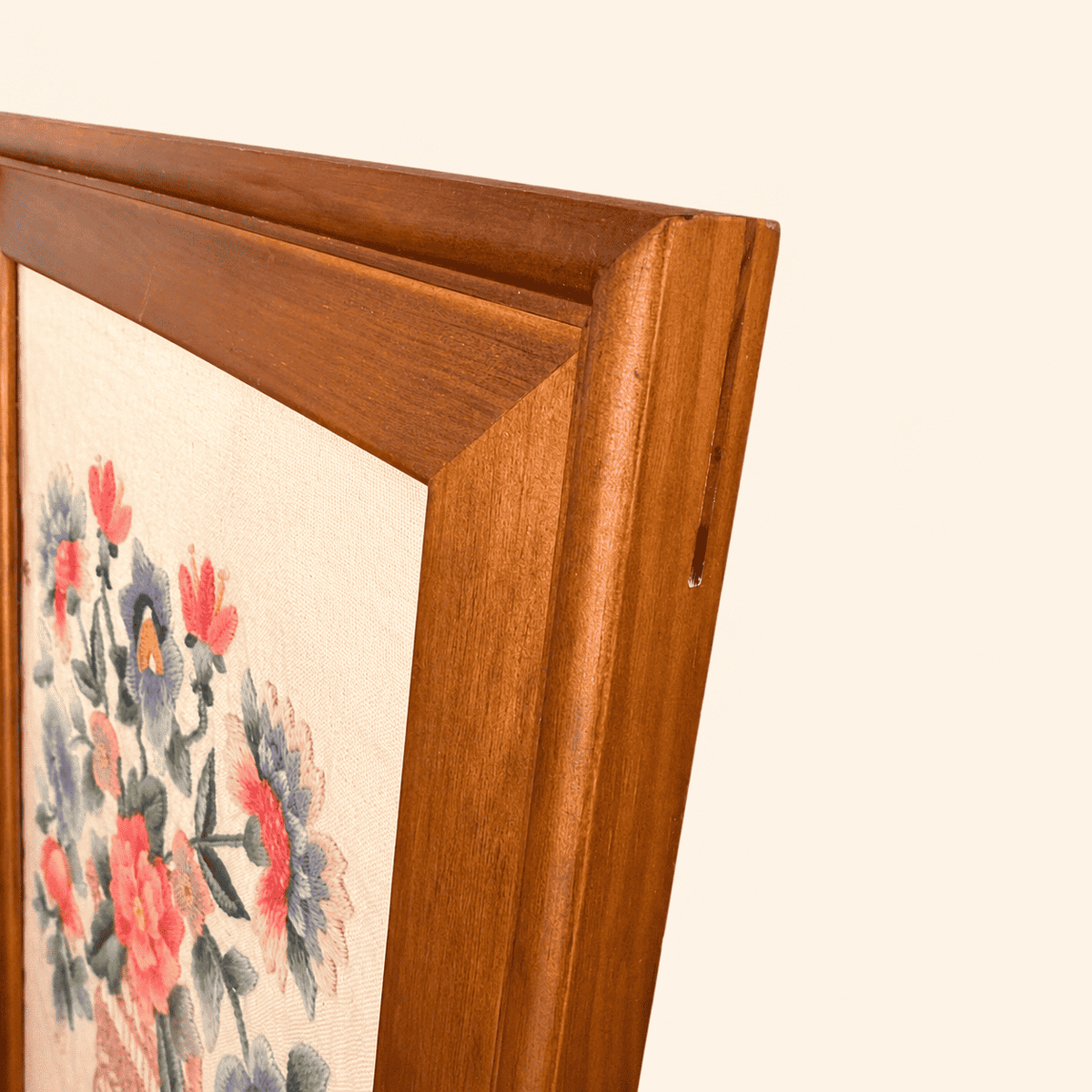 Detail of wood frame corner with walnut finish
