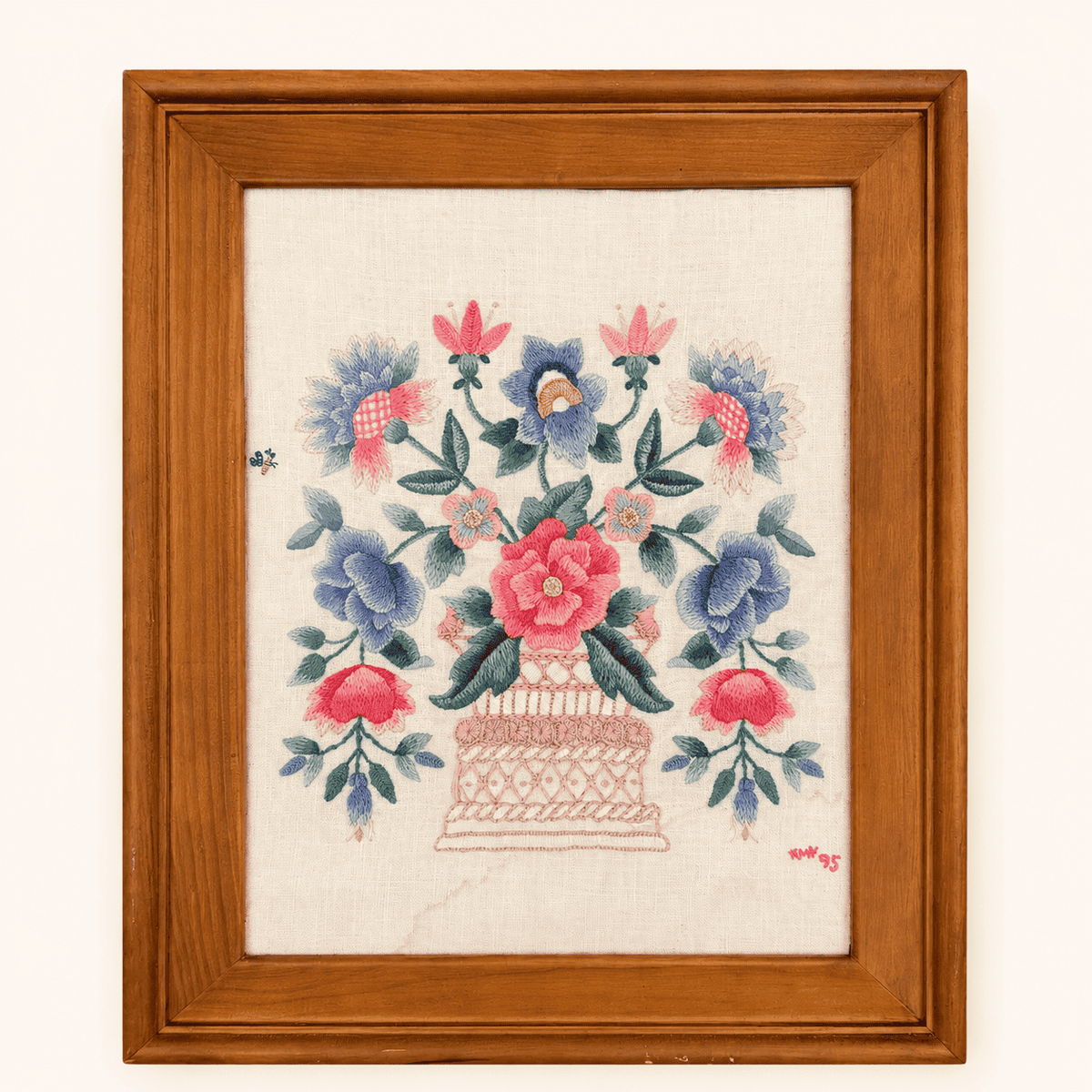 Embroidered initials and 95 date in corner