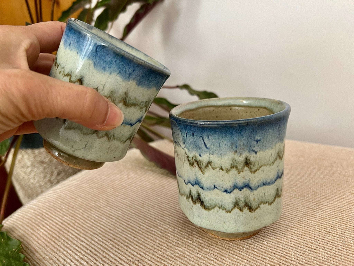 Pair of vintage studio pottery handleless tea cups with blue and celadon wavy glaze, photo 2 of 10