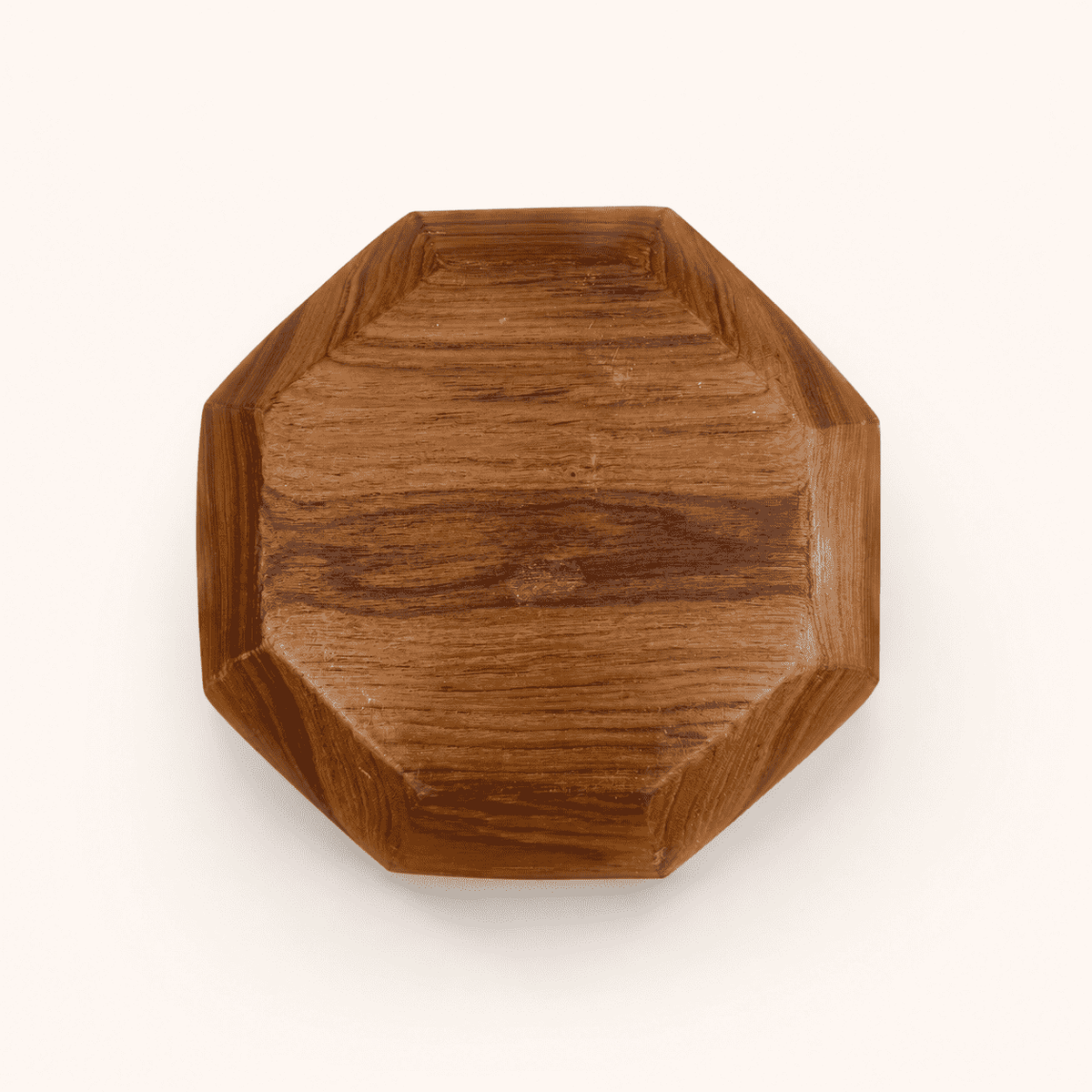 Bottom of octagonal teak bowl showing staved construction