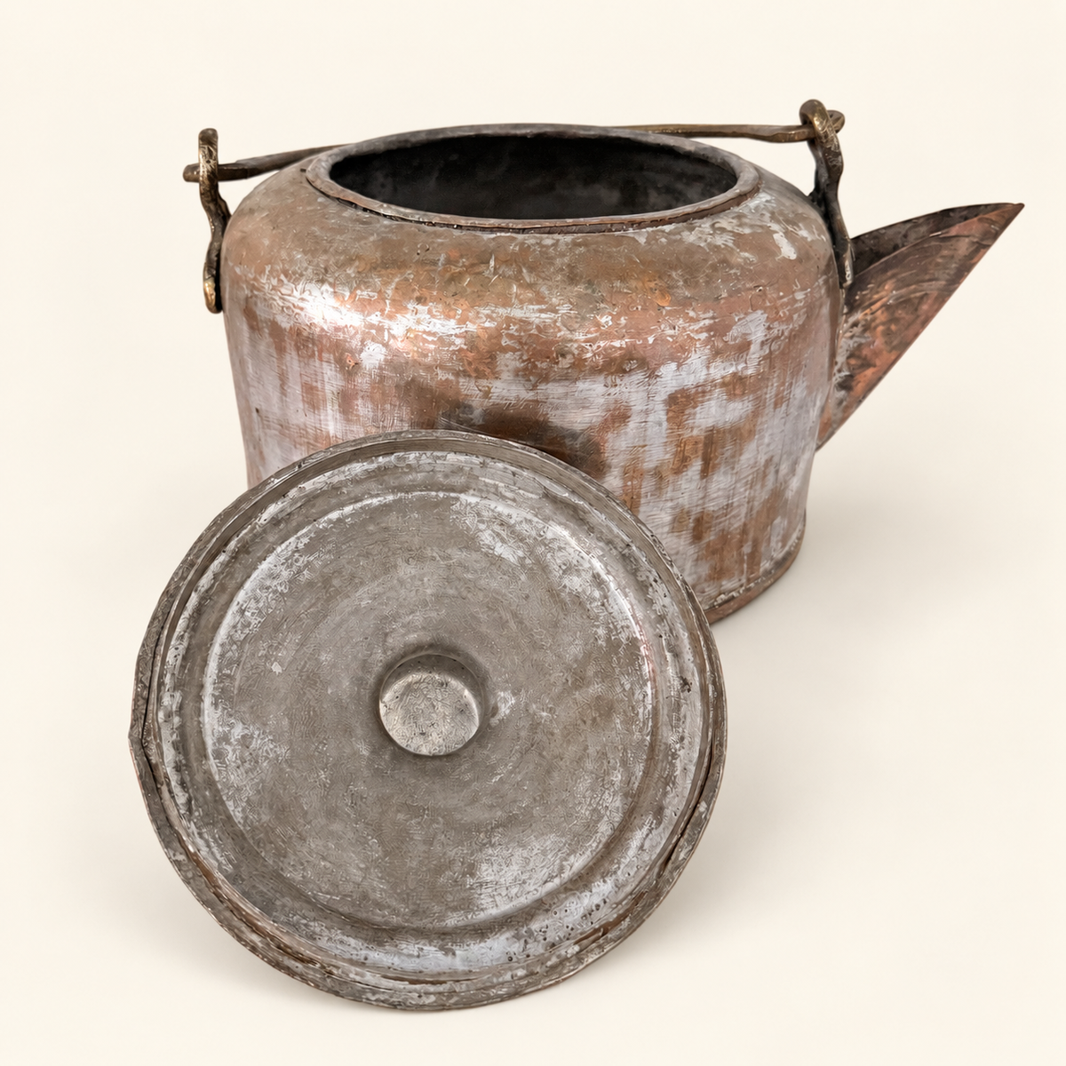 Kettle open with the tinned lid set in front, showing the knob finial and turned rings