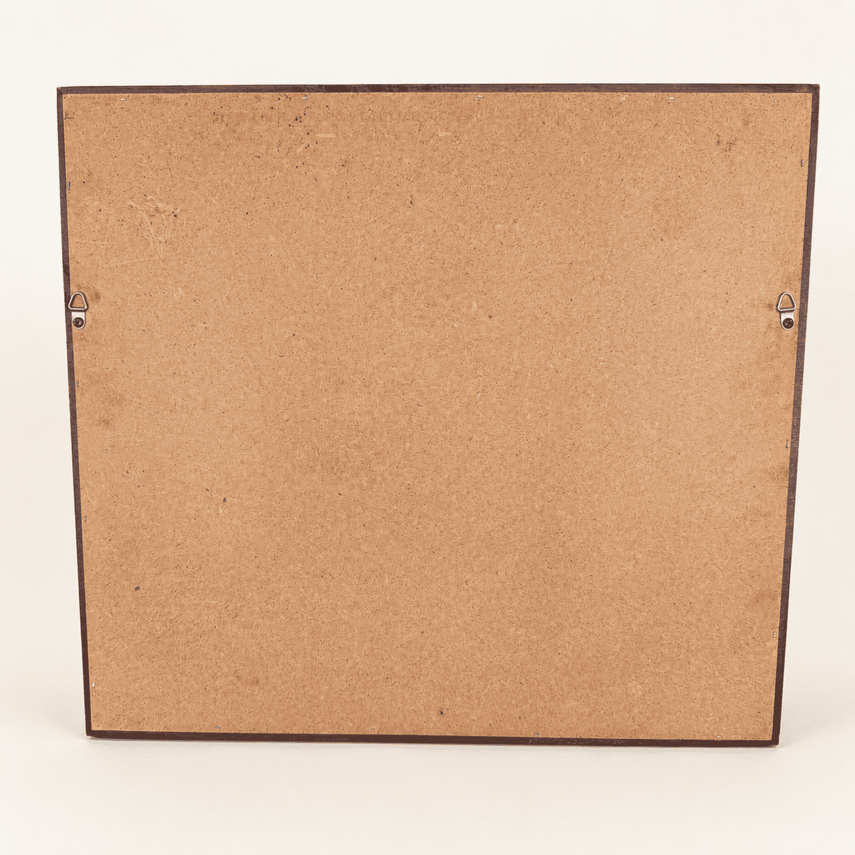 Back of Hitchcock mirror showing hardboard panel and wire hangers