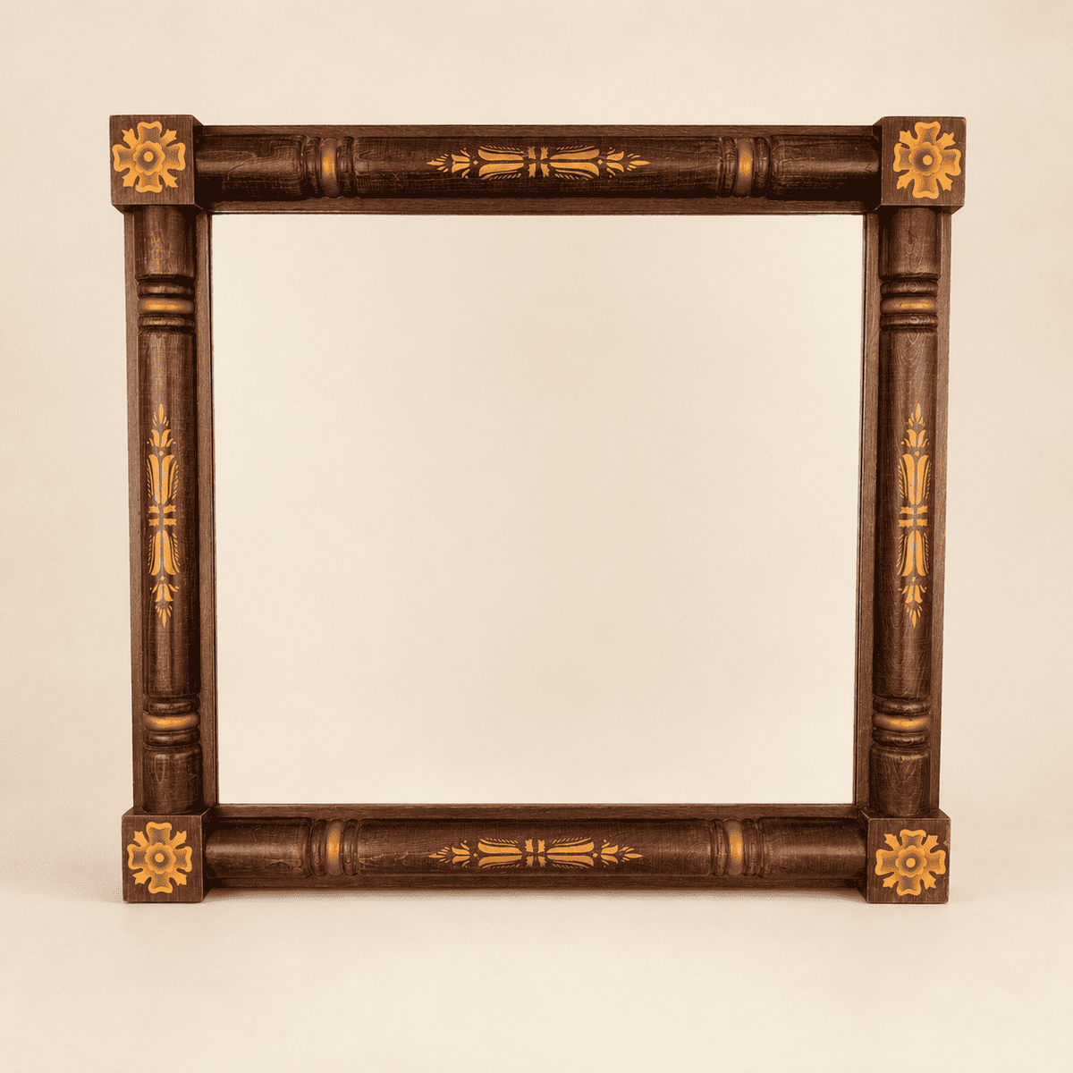 Vintage Hitchcock stenciled wall mirror with turned columns and gold rosettes, front view