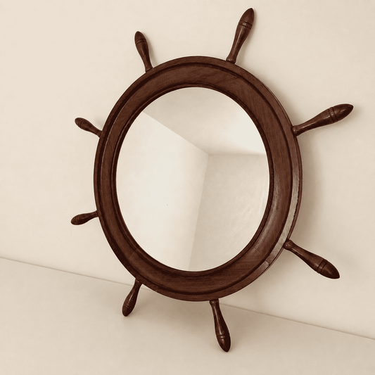 Angled view of the wood ship's wheel mirror on a wall