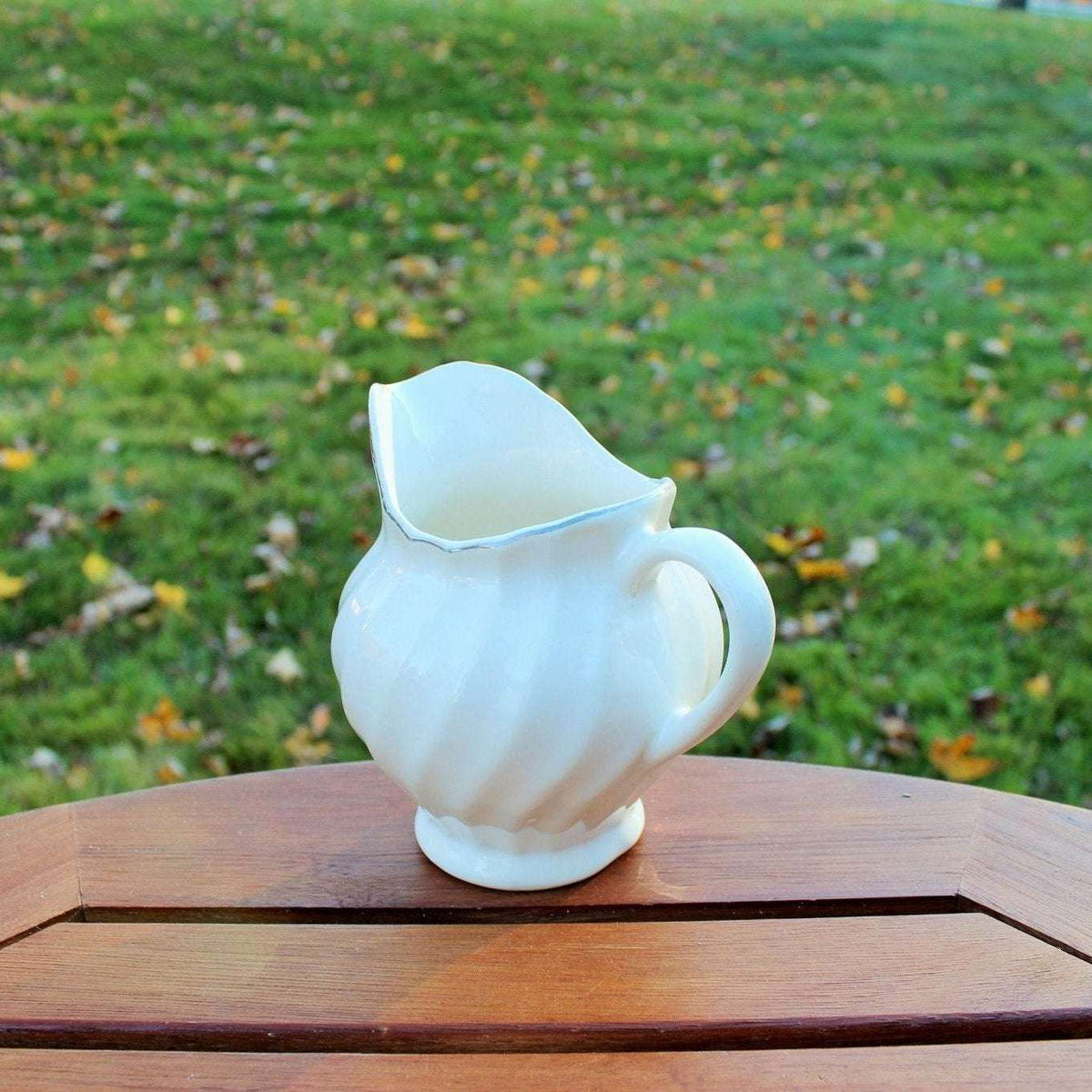 Vintage white ceramic swirl creamer with silver trim, photo 9 of 10