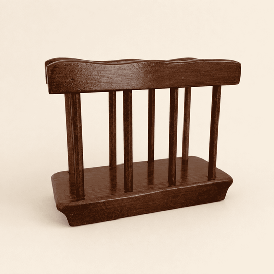 Vintage wood napkin holder with turned spindles and shaped top, front view