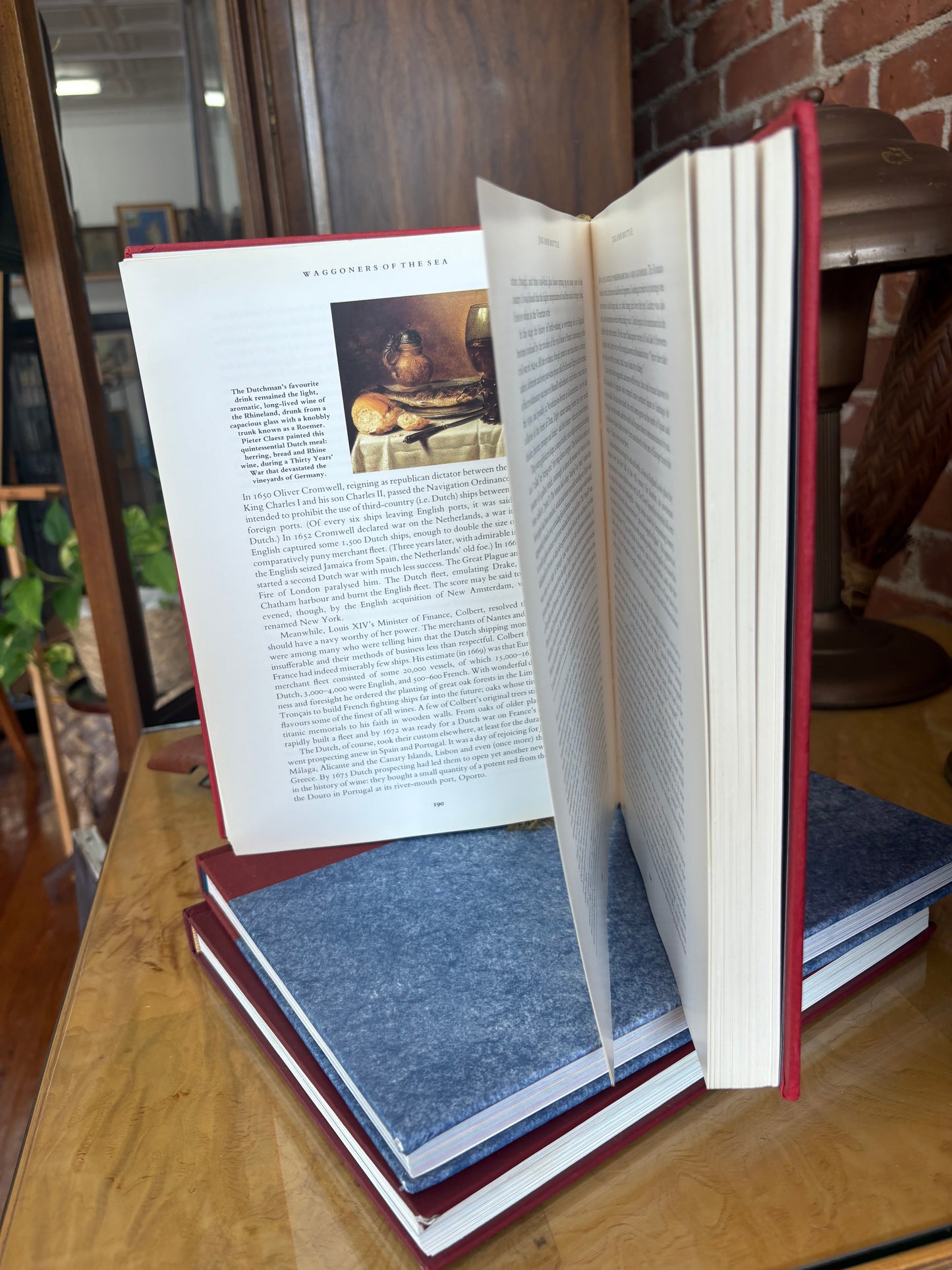 Red Clothbound “Vintage: The Story of Wine” by Hugh Johnson