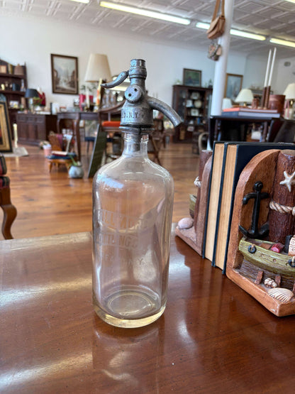 Fillmore Bottling Co. glass bottle — full view on a table