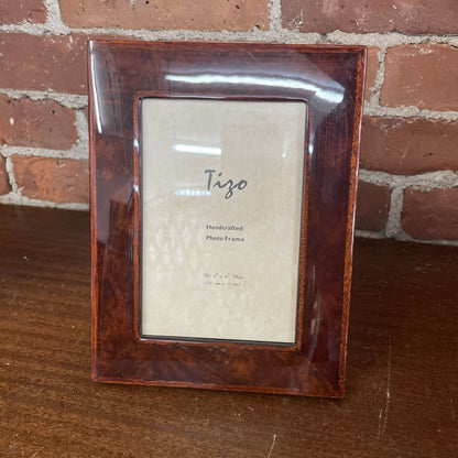 Tizo tortoiseshell lacquer picture frame — angled view with fold-out easel
