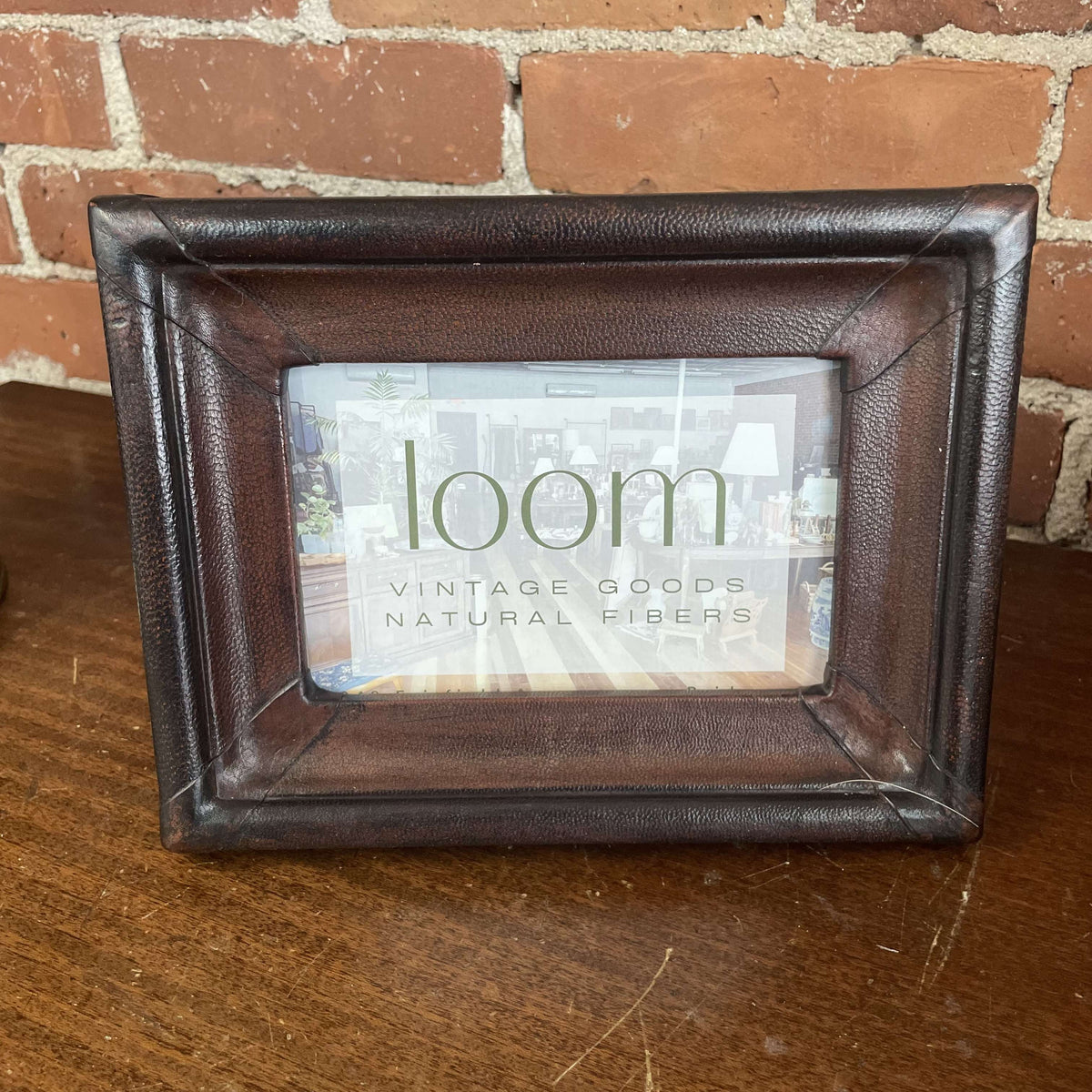 Brown leather-wrapped picture frame, front
