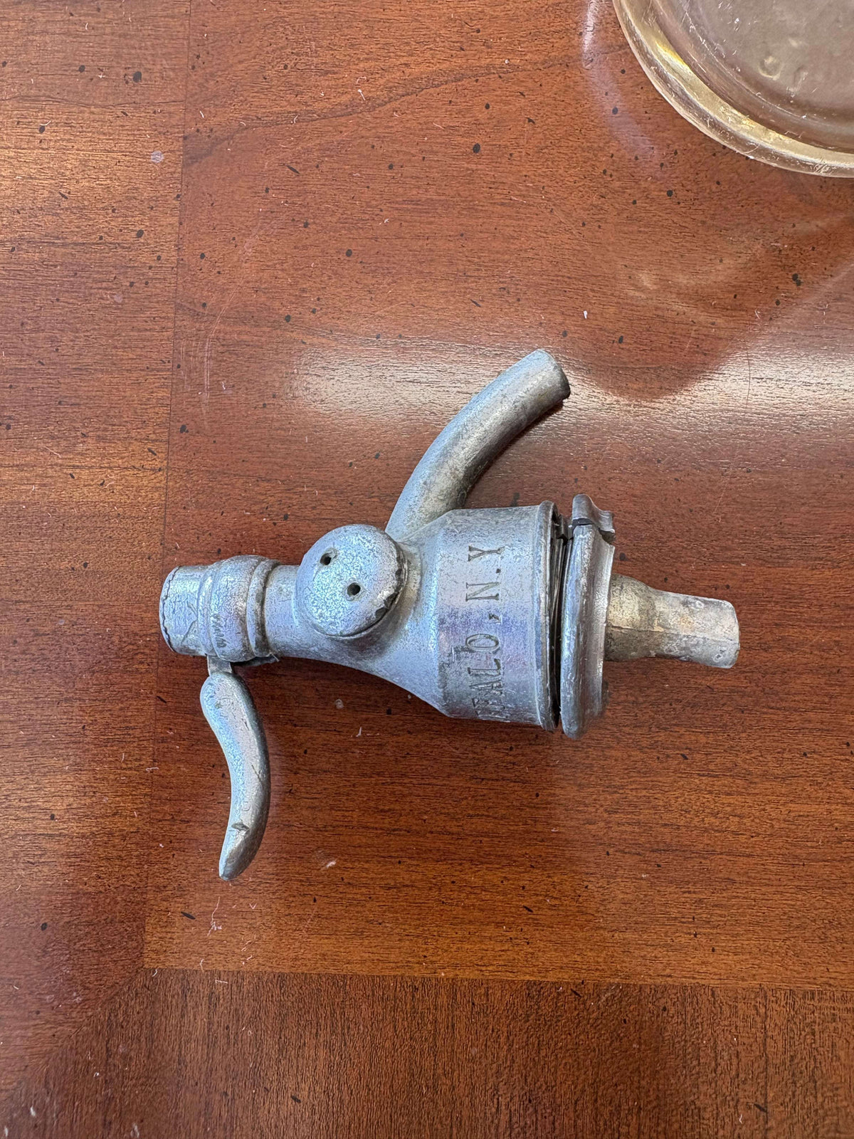 Fillmore Bottling Co. bottle — metal tap and lever detail