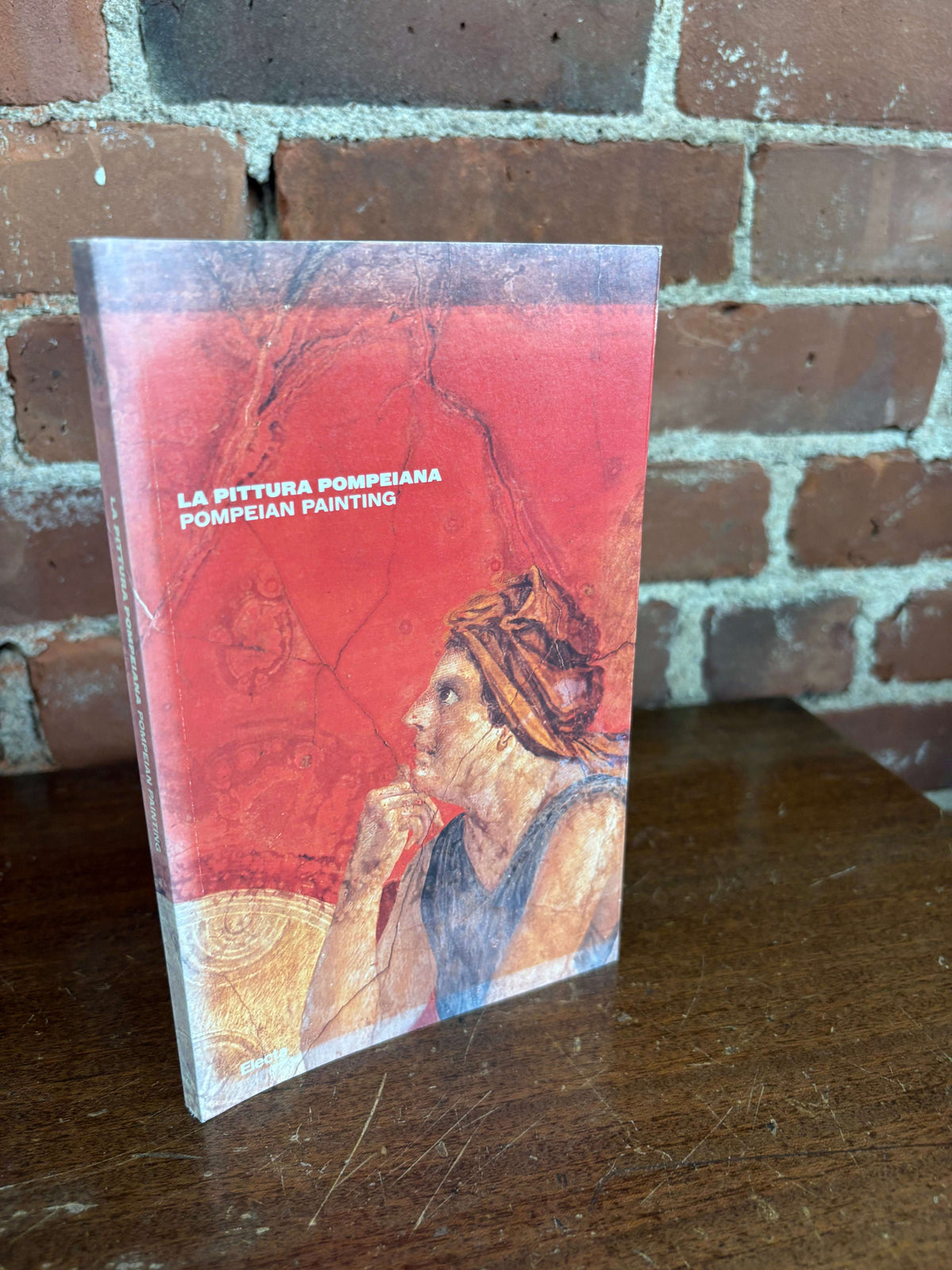 La Pittura Pompeiana art book cover with a Pompeian fresco