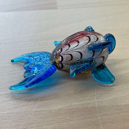 Art glass rainbow fish — top view of the colorful glass body
