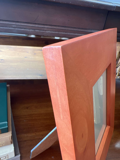 Wide wood picture frame — angled back view