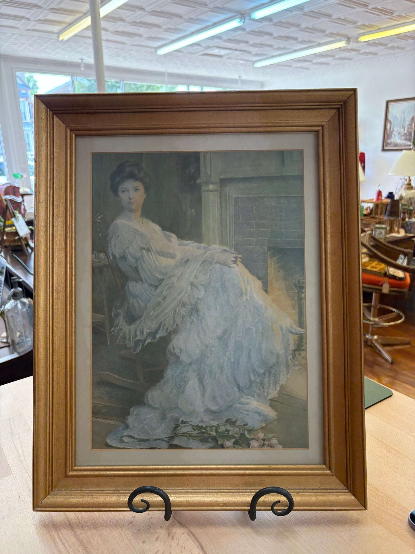 Edwardian Lady by the Hearth – Framed Print in Gilt Wood, 19″ × 15″