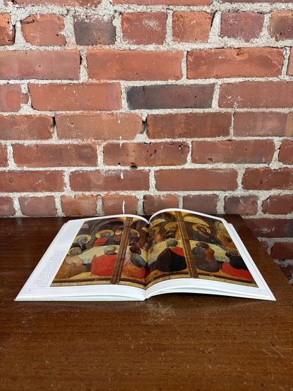 Siena guidebook open to color photography pages