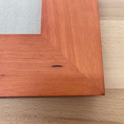 Stained wood frame corner grain detail