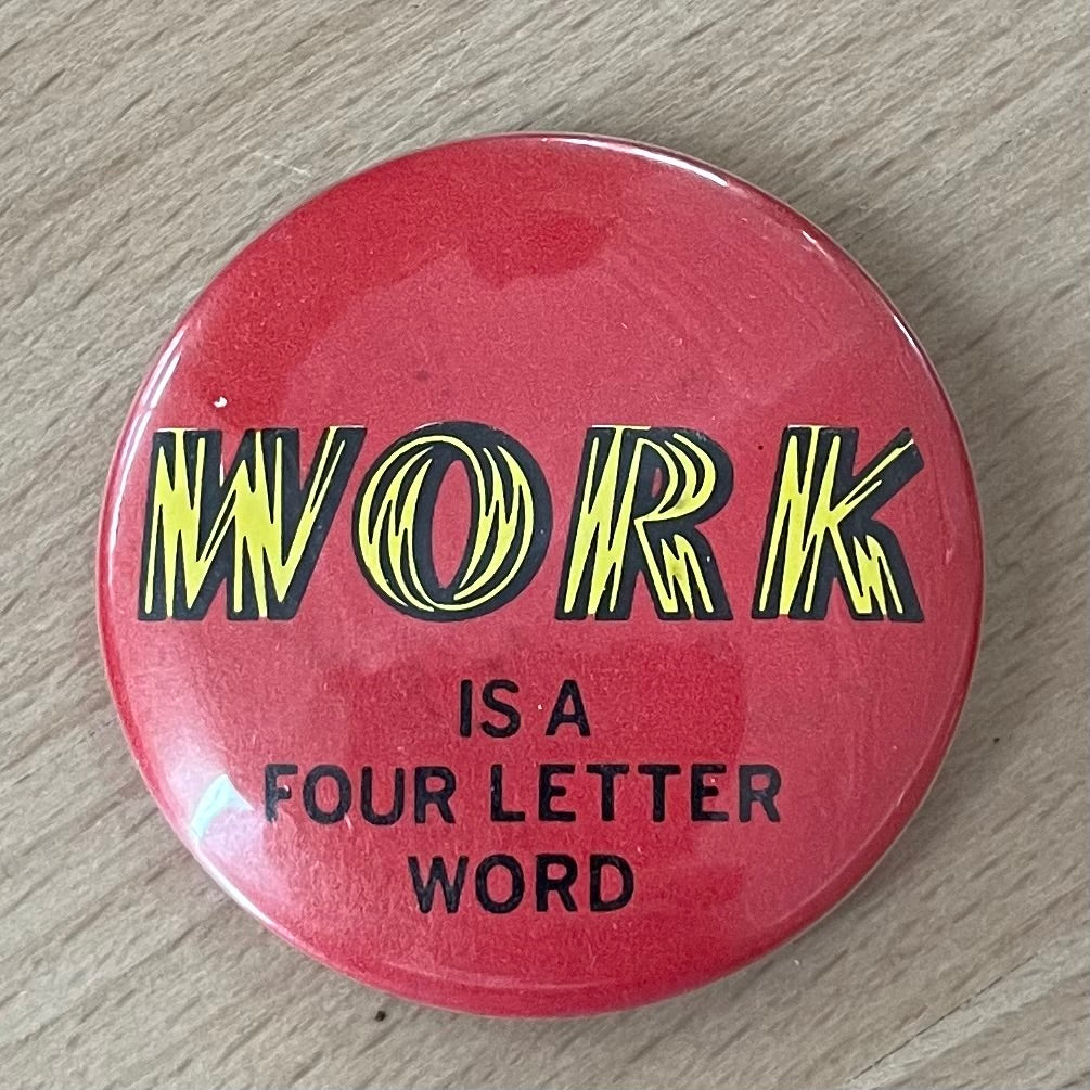 Vintage “Work is a Four Letter Word” Red Pinback Button – 2.25" Diameter