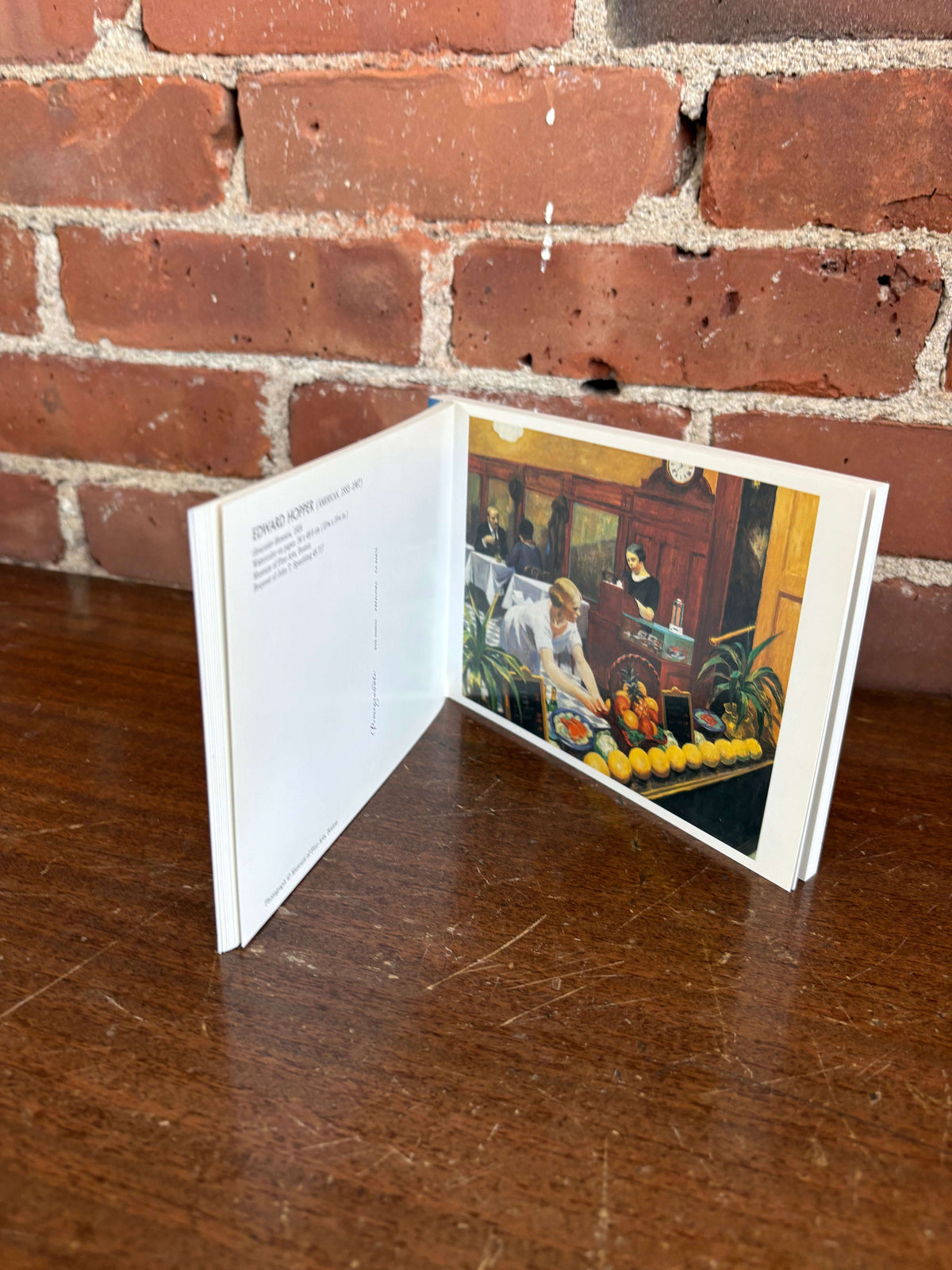 Edward Hopper book open to a painting page