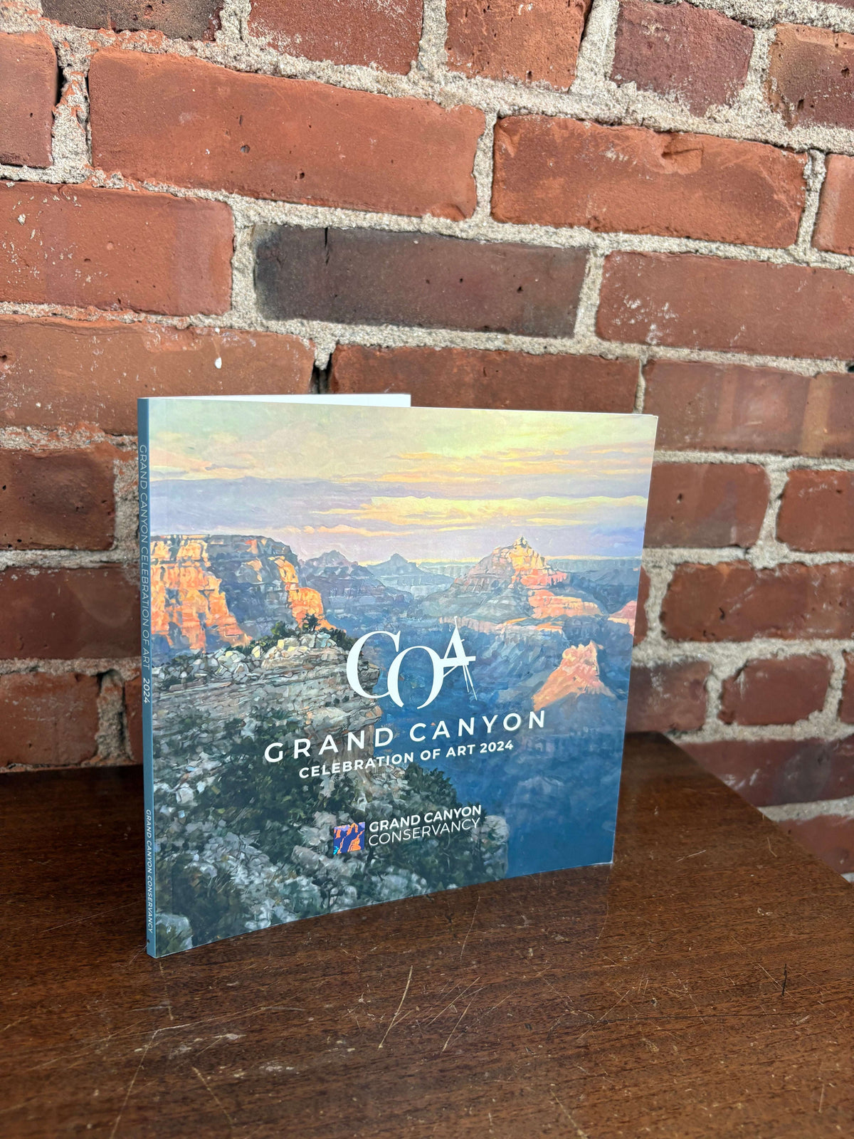 Grand Canyon Celebration of Art 2024 book cover with a canyon painting