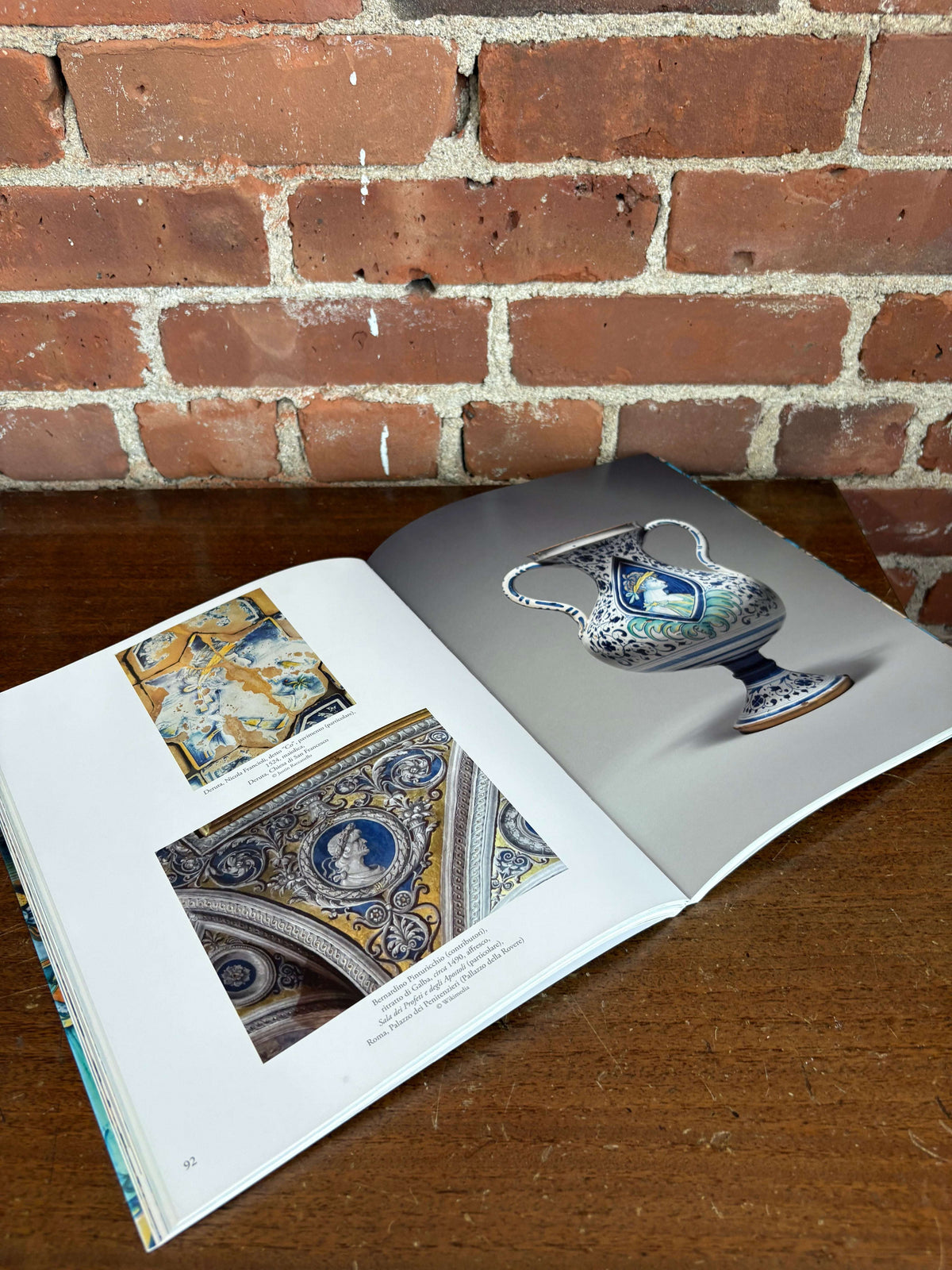 Back to Deruta book open to majolica plate pages