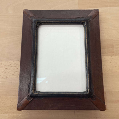 Embellished leather frame front, angled view
