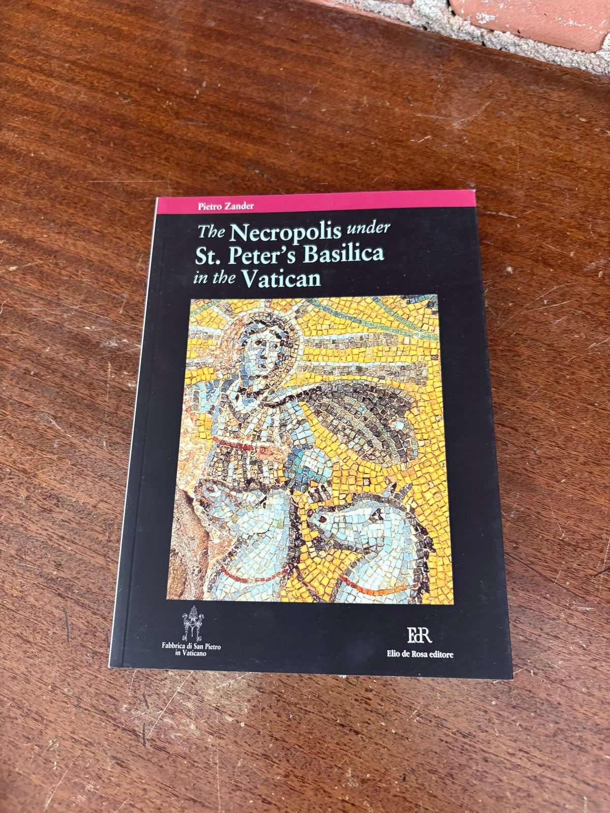 Cover of The Necropolis under St. Peter's Basilica in the Vatican, showing the golden mosaic of Christ as the Sun from the Mausoleum of the Julii