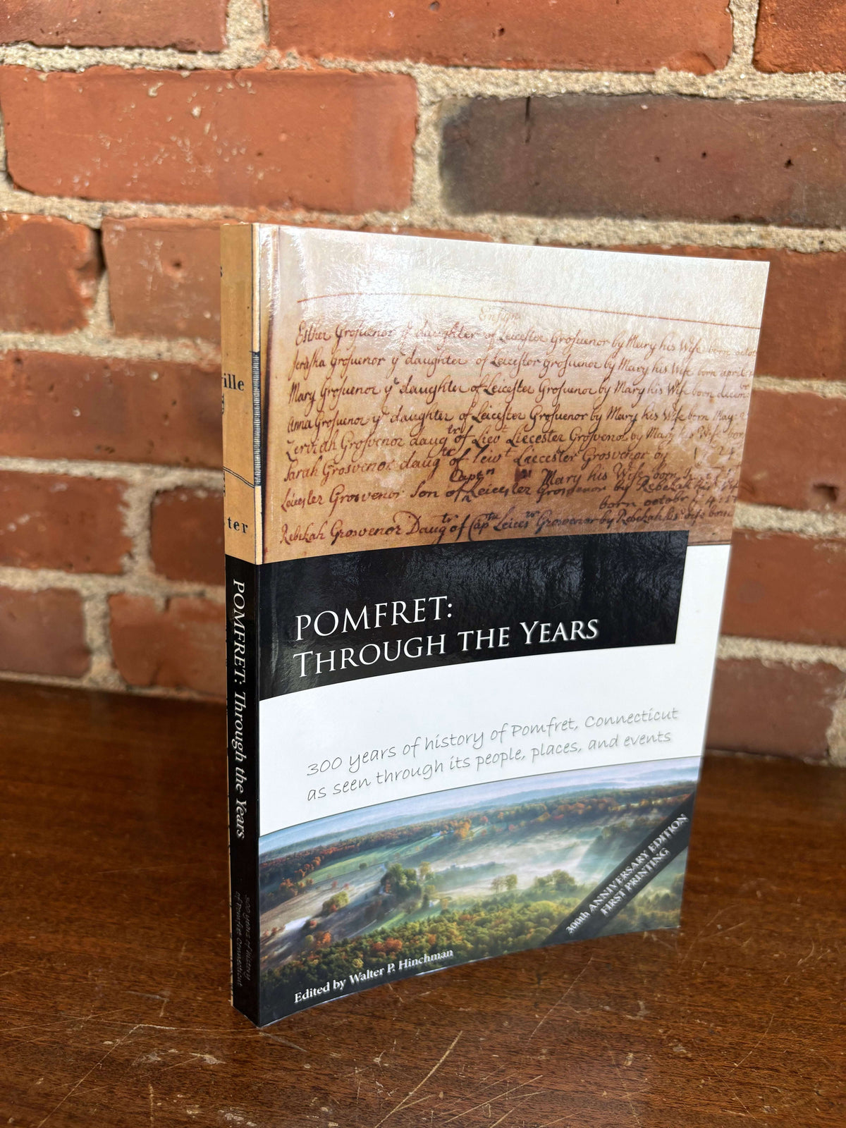 Pomfret: Through the Years book cover with an old document
