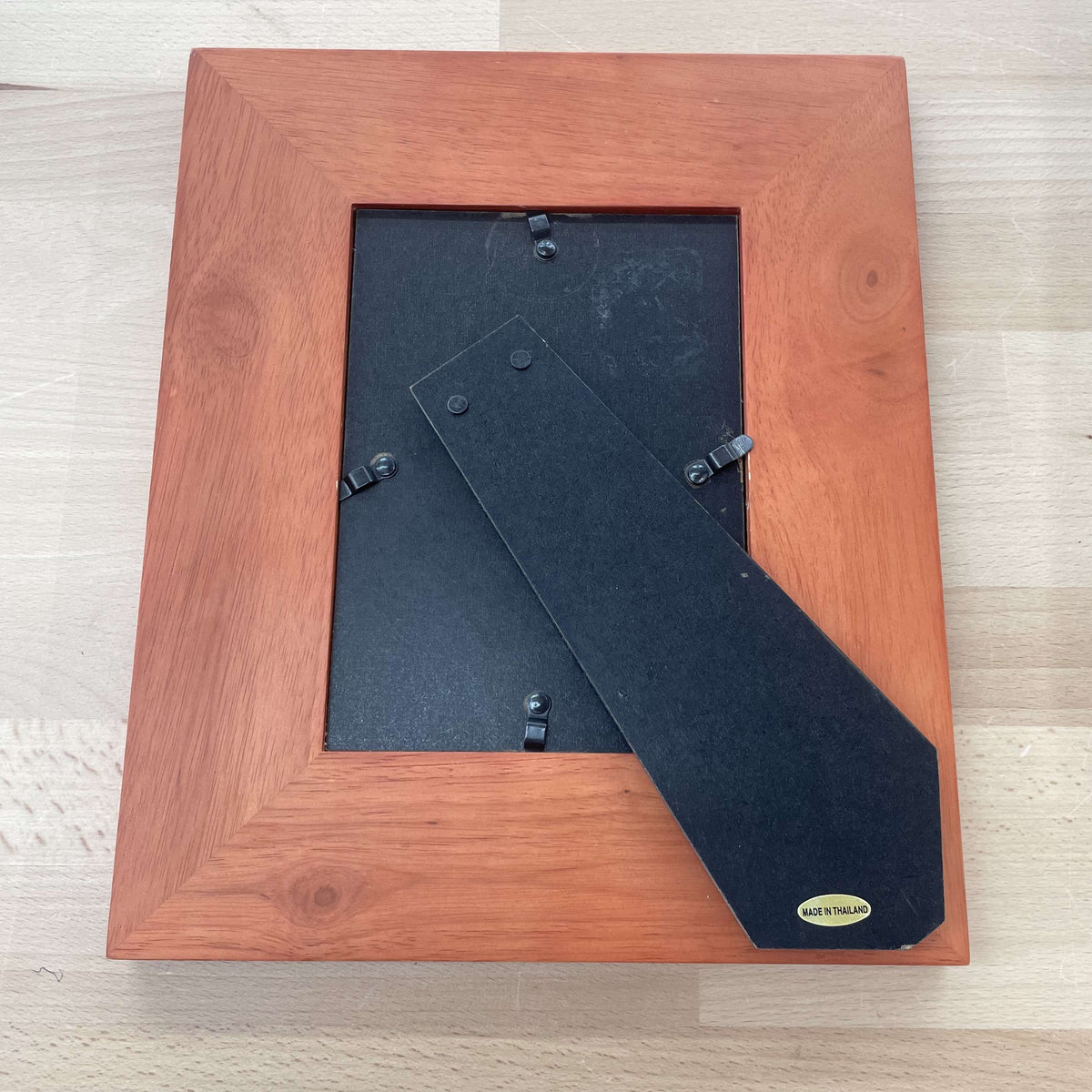 Stained wood frame back, angled