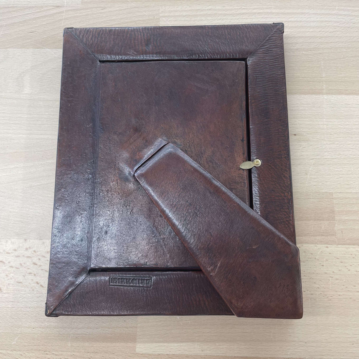 Embellished leather frame back, angled