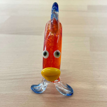 Art glass fish magnifier — front view with yellow lips and glass eyes