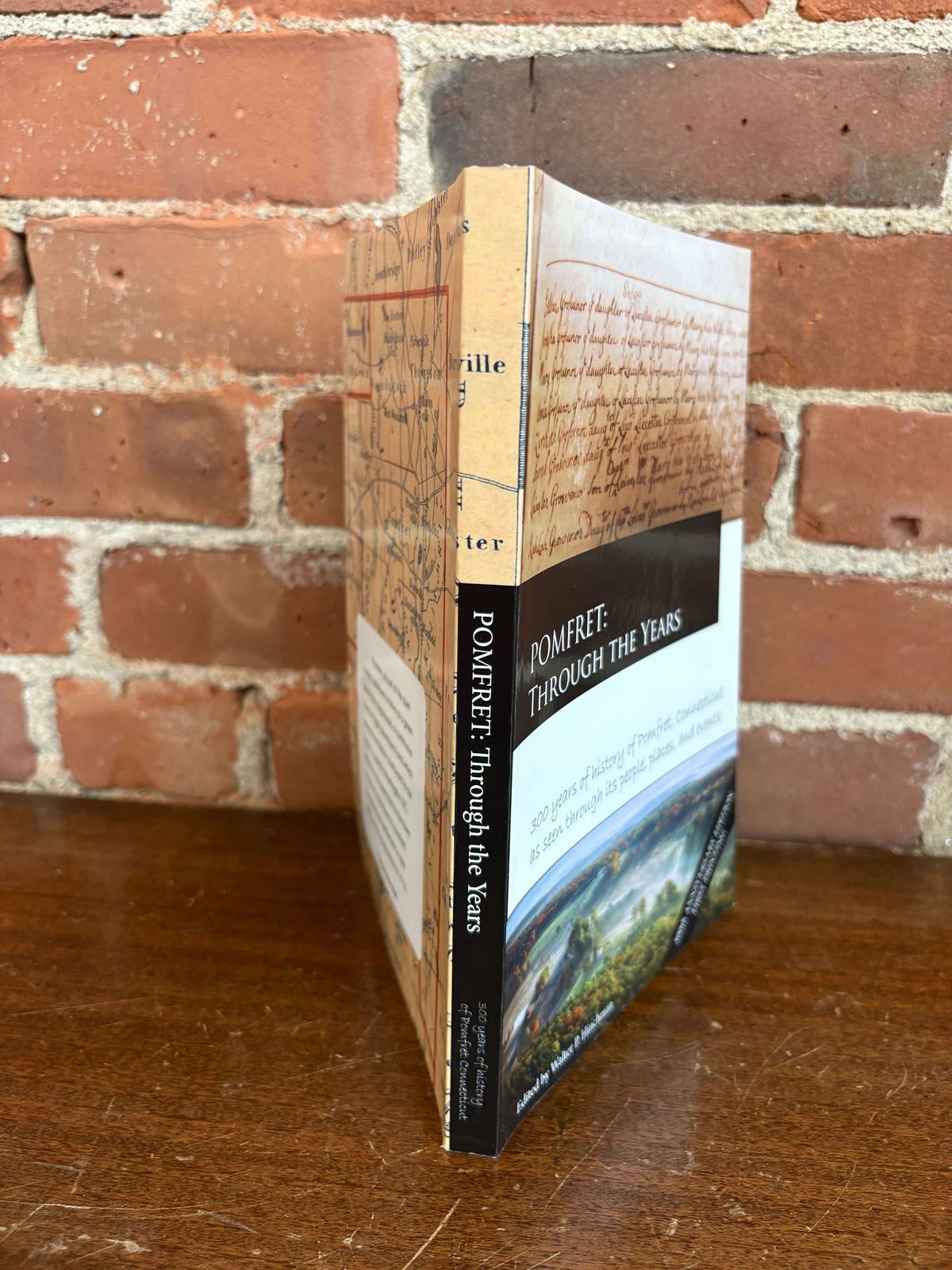 Pomfret history book standing, spine and cover