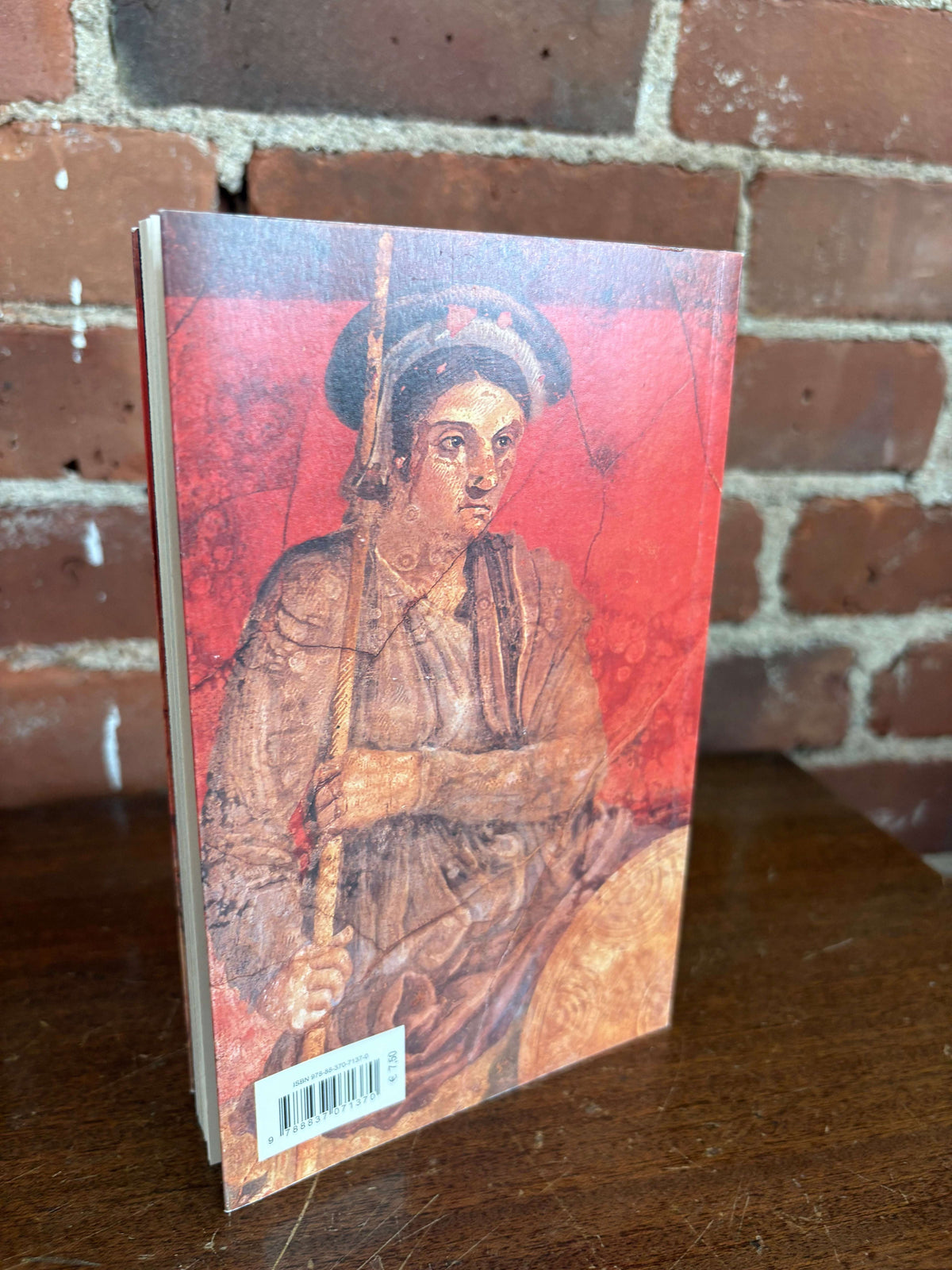 La Pittura Pompeiana book back cover with a Pompeian portrait