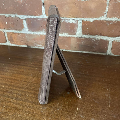 Snakeskin frame side view with easel back