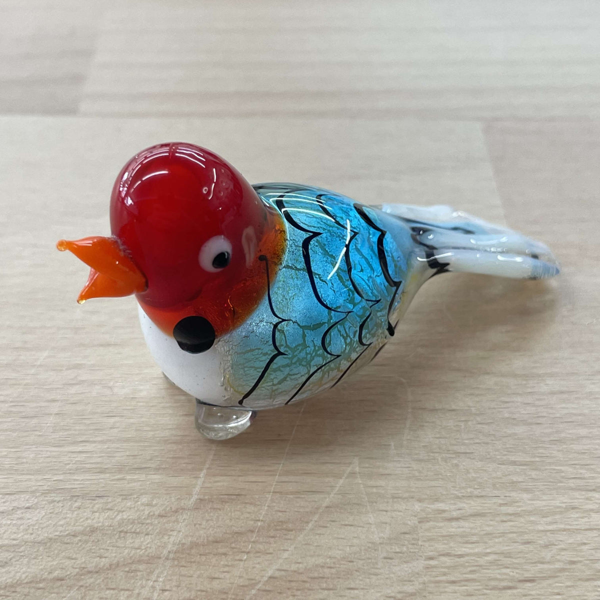 Vintage Murano foil glass bird figurine with a red head and turquoise scaled body